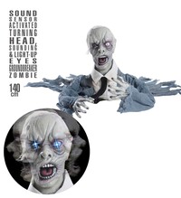 Zombie s otáčející se hlavou, zbukem a blikajícíma očima 140cm